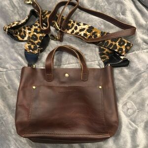 Mini Portland leather crossbody tote.
